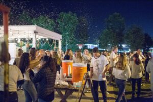 Best Beer Festivals 2022; people dancing and enjoying drinks outdoors