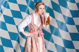 oktoberfest ideas; a girl dressed in Bavarian clothing