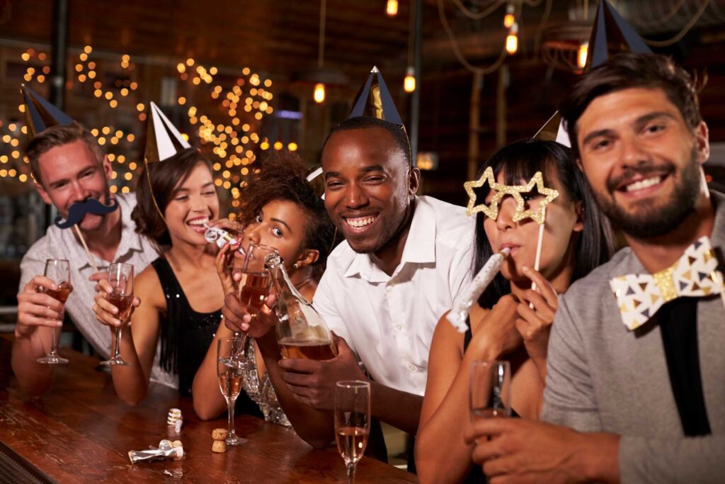 business new year resolutions; friends in a bar
