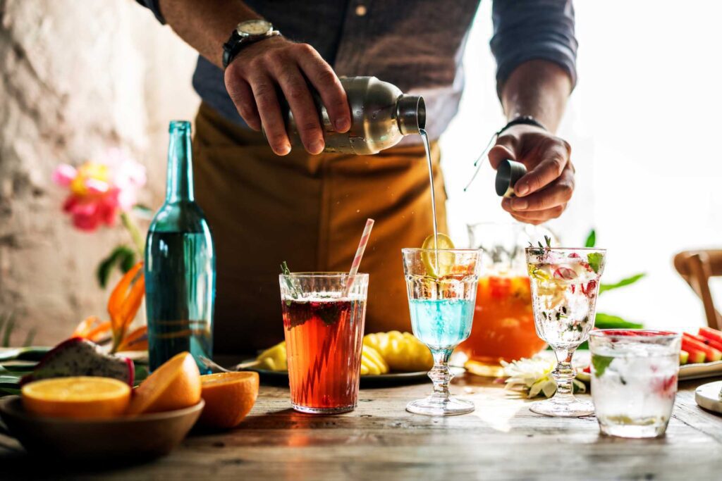 cocktail trends 2023; a man making cocktails